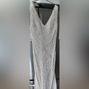Custom crystal beaded (hand beaded) evening gown withh keyhole back and train.